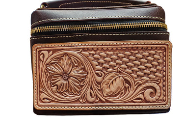 A leather crafting tooling panel with floral patterns on a white background.