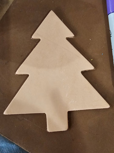 A leather tree used for gifts or holiday tree ornaments.