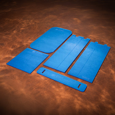 Set of blue foam pads on a brown leather surface