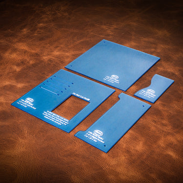 A set of blue acrylic templates for creating a custom cafe-racer style wallet, laid out on a brown textured leather background.
