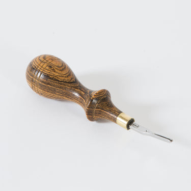Montana Edger tool 1 by Ron's Tools with a metal tip and wooden handle, used for leatherworking and leathercraft creating fine edges on leather, displayed on a white background