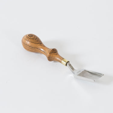 A straight French edger 12 tool by Ron's Tools used for leatherworking and leathercraft on a white background.