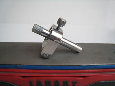 Keen Edge swivel knife sharpening guide on a bench stone