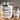 Contact cement glue in a metal can with integrated brush applicator