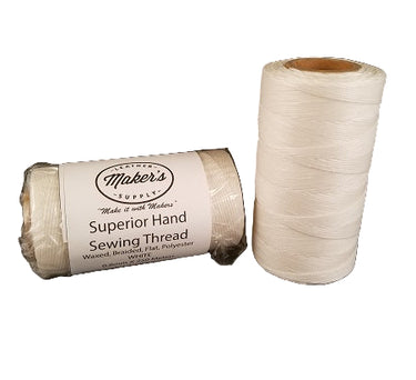 Two spools of MLS Superior Hand Sewing Thread by Maker's, displayed on a white background, with one spool standing upright and the other lying horizontally.