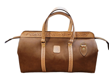 A leather Stockyards Duffell Bag with tooling accents, displayed on a white background.