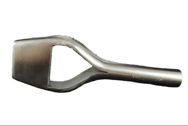 A silver metal bag punch tool resting in front of a white background.