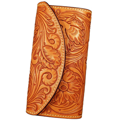 A brown leather clutch purse with floral embossing on a white background.