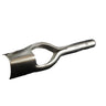 A metal strap end punch tool lying on a whit surface.