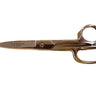 A pair of high quality EZ Cut shears/scissors with a shiny nickel finish, lying on a piece of leather.