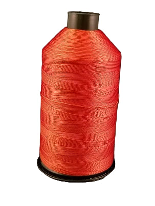 A spool of orange-brown bonded nylon thread on a white background.