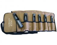 A set of belt punches in varying sizes, neatly arranged in a tool belt which is beige in color.