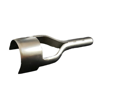 A metal round end punch tool lying on a white surface.