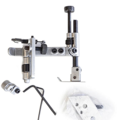 A COBRA drop down guide accessory for sewing machines, including the metal frame, screws, and an Allen key.