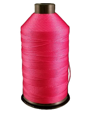 A spool of pink bonded nylon thread for sewing machines.