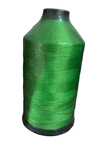 A spool of lime green to neon green bonded nylon thread.