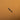metal scalpel blade on a brown leather background