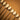 A close up of some daubers  used for applying various applicators such as paint or adhesives. Laid out on a light brown textured leather background. 