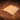 An acrylic leather stamp holder with holes and four small metal beams on a brown leather surface.