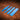 Four blue acrylic templates for creating straps on a brown leather surface