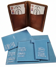 Load image into Gallery viewer, Brown leather cardholder with cards and blue paper packages on a white background