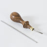 Montana Edger tool 5 by Ron's Tools with a metal tip and wooden handle, used for leatherworking and leathercraft creating fine edges on leather, displayed on a white background