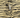 Close-up of a stingray fabric with a zebra print pattern on a beige background