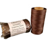 A spool of brown hand sewing thread and a packaged thread roll, both with product information visible.