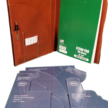 A set of acrylic templates laid out on a table with a finished padfolio and notepad in the background.