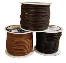 Load image into Gallery viewer, Three spools of leather lace in light brown, dark brown, and black colors, placed on a wooden surface.