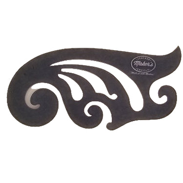 An acrylic template French Curve design tool with a complex, swirling pattern.
