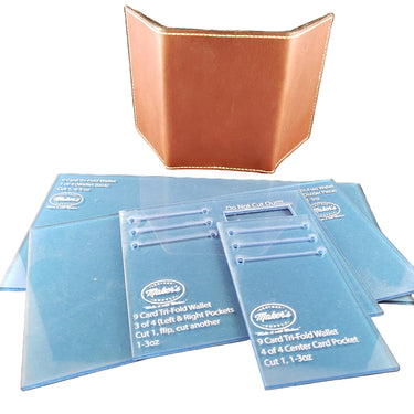 A set of blue acrylic templates for making a tri-fold wallet displayed next to a brown leather tri-fold wallet.