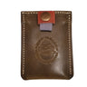 A brown leather ribbon wallet with a snap closure and embossed logo on the front.