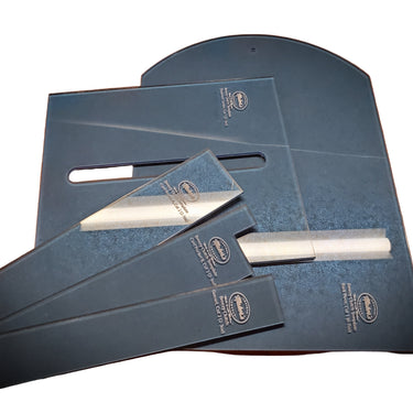 A set of acrylic templates for crafting a clutch purse or wallet, displayed on a white surface.