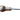 A sharp pointed scratch awl with a tempered blade and a wooden handle, lying on a flat white surface.