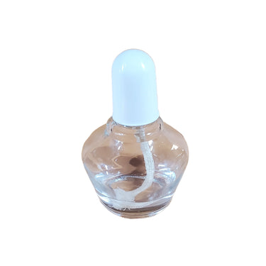 A glass alcohol burner with a cap on top on a white background. Inside is a string used for lighting the flame.