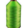 A spool of green bonded nylon thread for sewing machines.