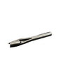 A metal round end punch tool lying on a white surface.